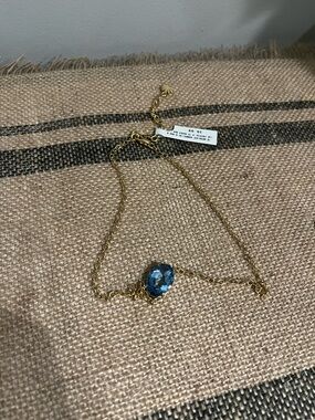 Gold Chain Necklace with Blue Oval Gemstone